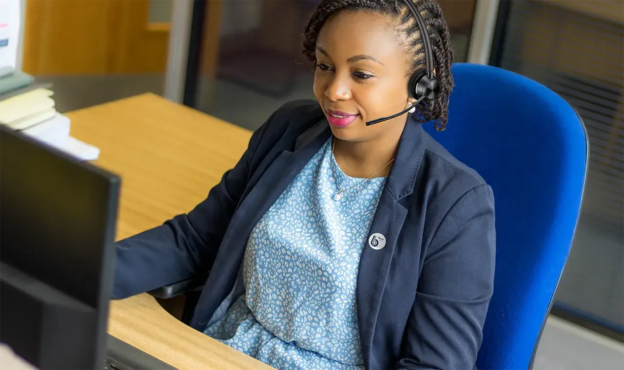 Breyer Operative taking call on earpiece