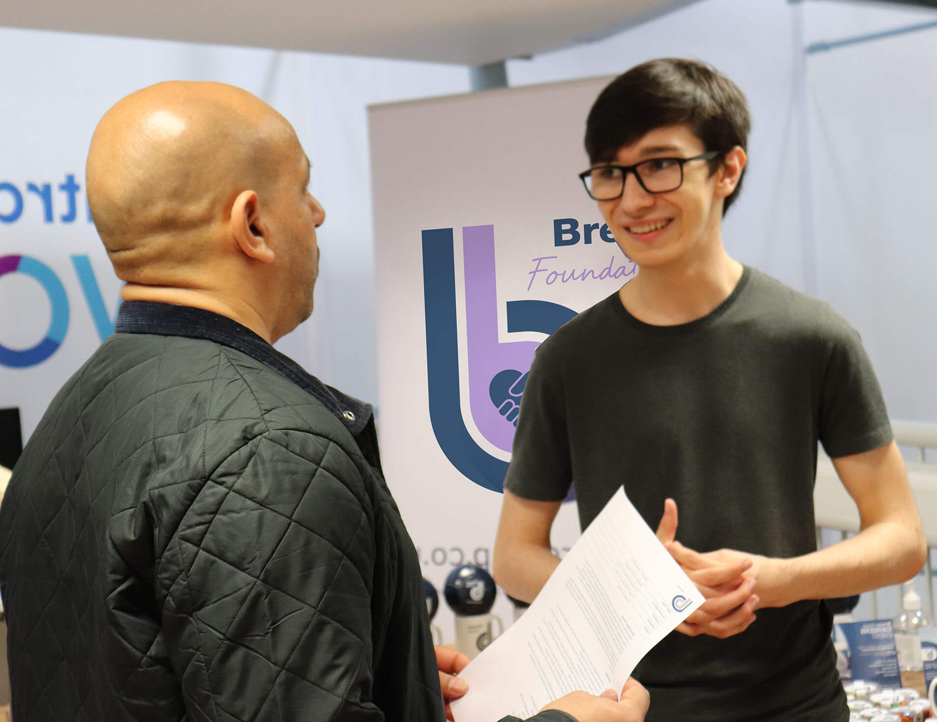 Breyer staff at jobs fair talking with potential new talent